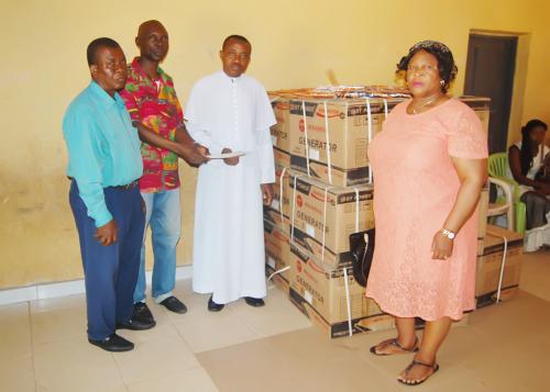 Official presentation of the list of items donated by the foundation to Rev. Igbokwu of St Mark’s church Arondizuogu.
